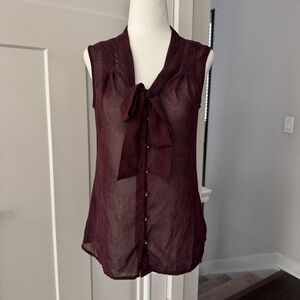 Burgundy sheer blouse with button front and bow neck detail